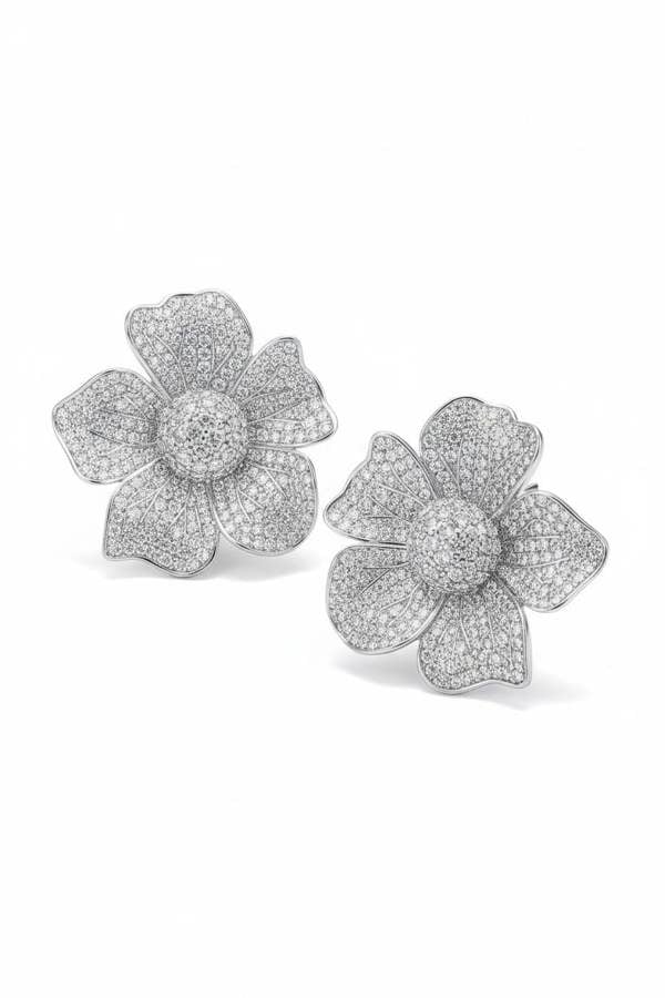 Silver pansy shaped earrings with embedded clear gemstones