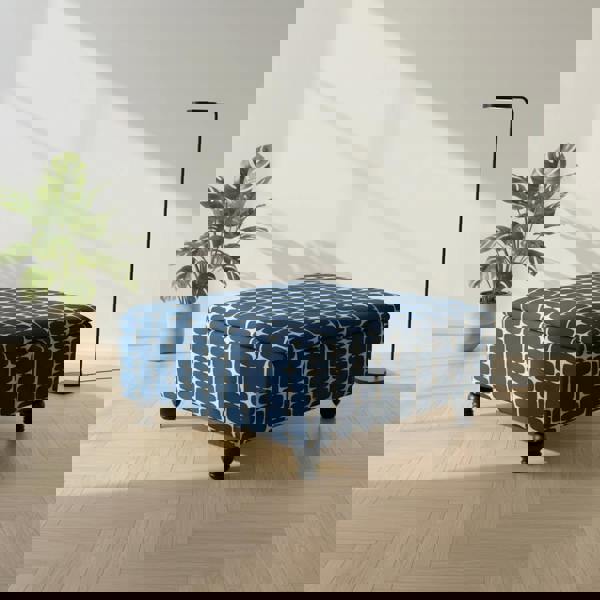 High-quality upholstered ottoman used as coffee table and footrest