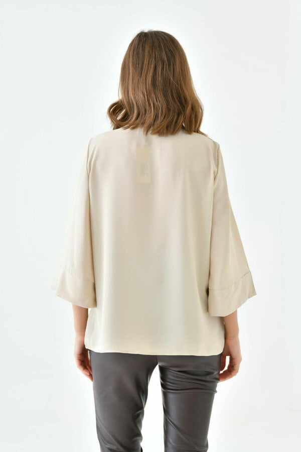 Hoxton Gal Oversized Fit 3/4 Sleeve Asymmetric Layered Blouse in Beige with Necklace