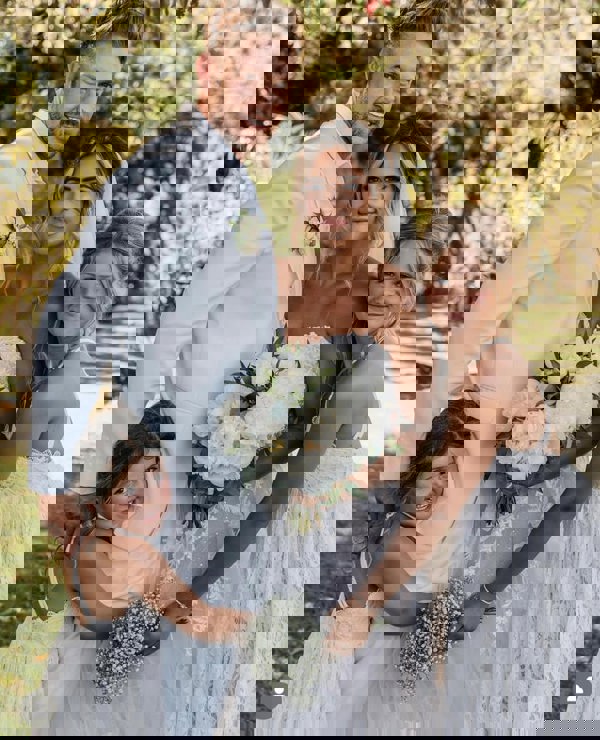 Young girls and family at a wedding