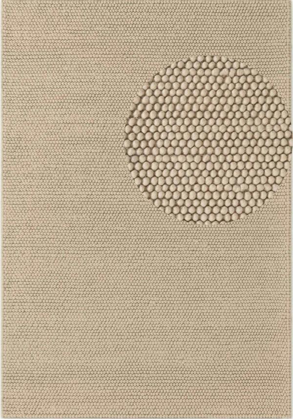 Beige rug with a central circular pattern