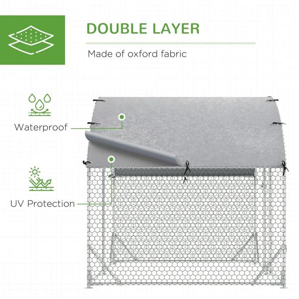 Chicken run with grey water-resistant cover fastened by grommets over mesh walls
