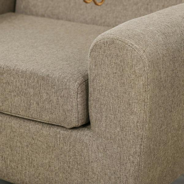 Brown upholstered toddler armrest and seat cushion with textured fabric close-up