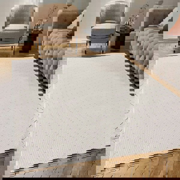 Living Room rug, beige-cream colours, dots, practicality in mind, the rug is anti-allergic.