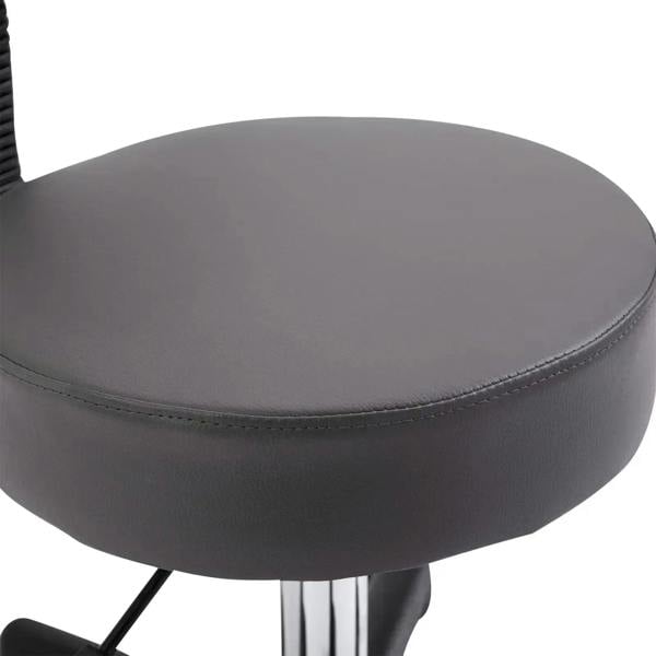 Grey padded salon chair seat with stitched seam and swivel support base