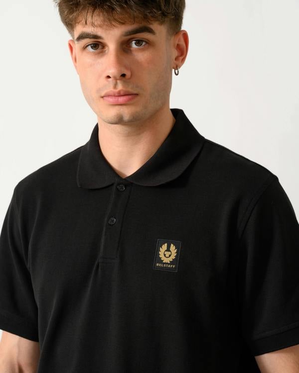 close up shot of a model wearing a Belstaff Mens Logo Polo in Black