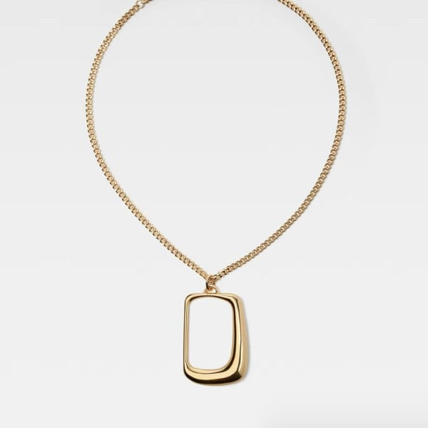 Jacquemus 'The Ovalo' J pendant necklace in a gold tone finish
