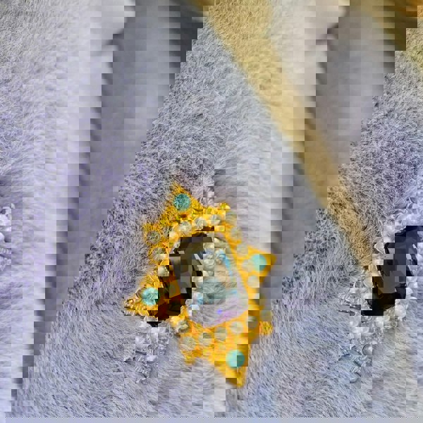 blue vintage brooch in gold