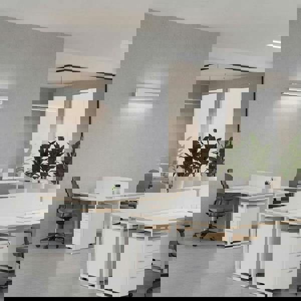 Silver up and down dimmable internal wall light on the wall of  a modern office suite