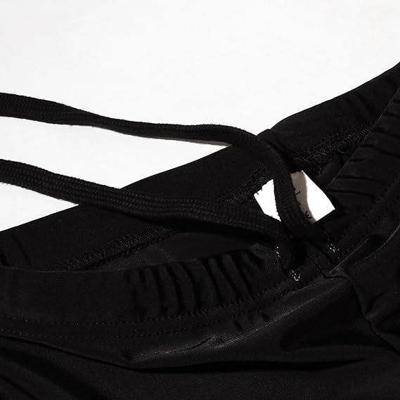 Close-up of black Optimum Multi-X shorts waistband with drawstring, on white - Optimum