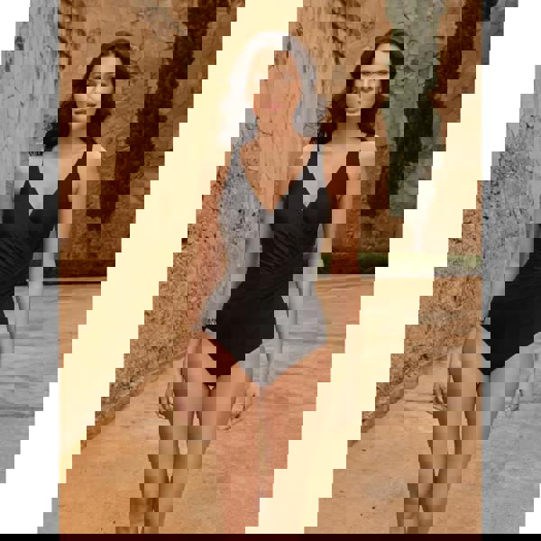 Black Miraclesuit Oceanus swimsuit in Miratex fabric with deep V-neck