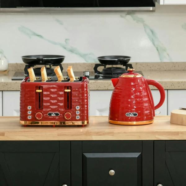 Red kettle and red 4-slice toaster on a kitchen counter