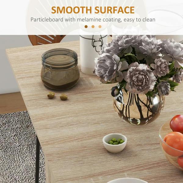 Natural wood tabletop with smooth finish on a foldable drop-leaf dining table