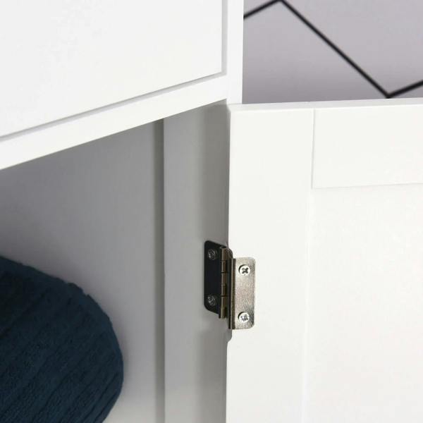 White cabinet door latch hardware with attached safety strap and screws
