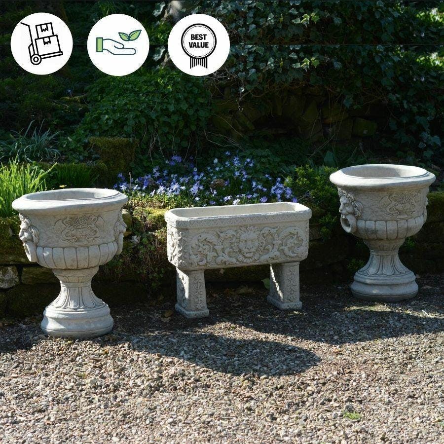 Rackhams Pair Of Lion Head Design Stone Vases And Planter Troughs