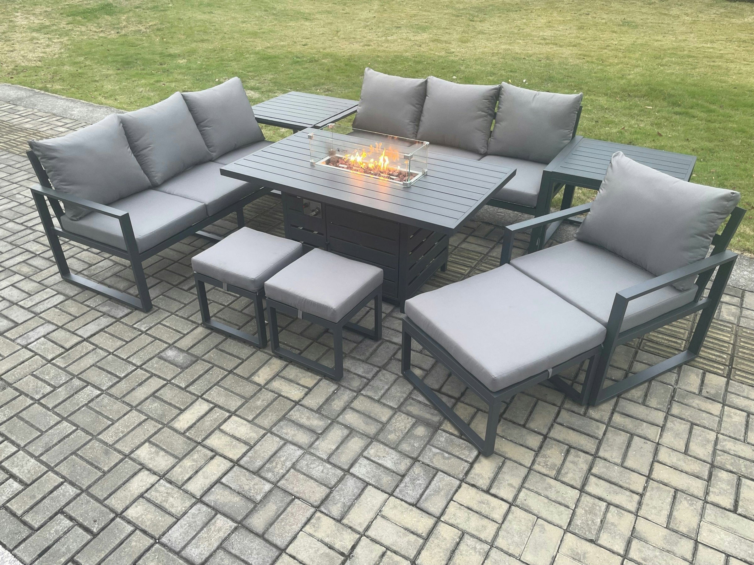 Rackhams Dark/Grey Aluminium 9 Pieces Garden Furniture Sofa Set With Cushions 10 Seater Gas Fire Pit Dining Table Set With 2 Side Tables 3 Footstools