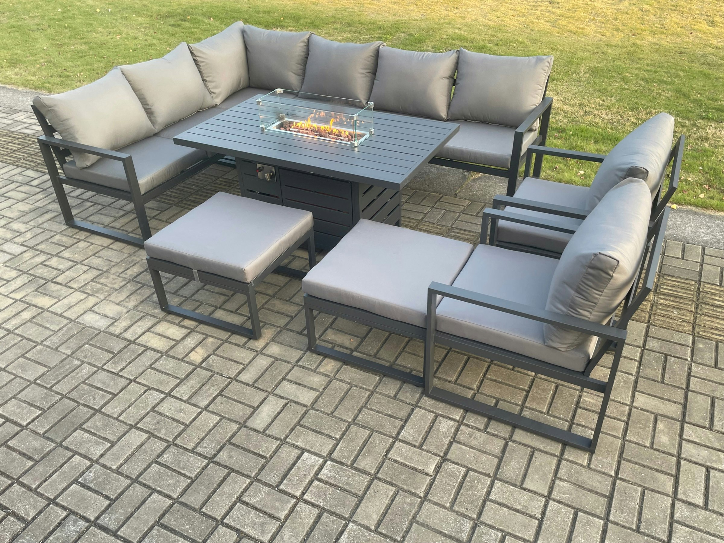 Rackhams Dark/Grey Aluminium Patio Outdoor Garden Furniture Corner Sofa Set Gas Fire Pit Dining Table With 2 Chairs 2 Big Footstools