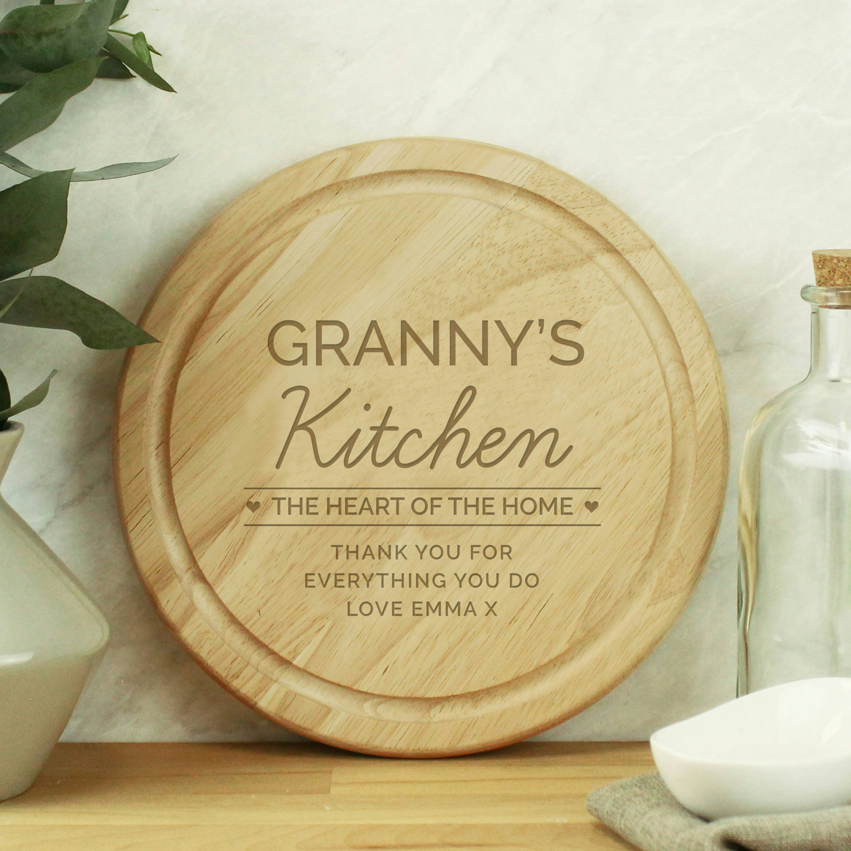 Rackhams Personalised Heart Of The Home Round Wooden Chopping Board