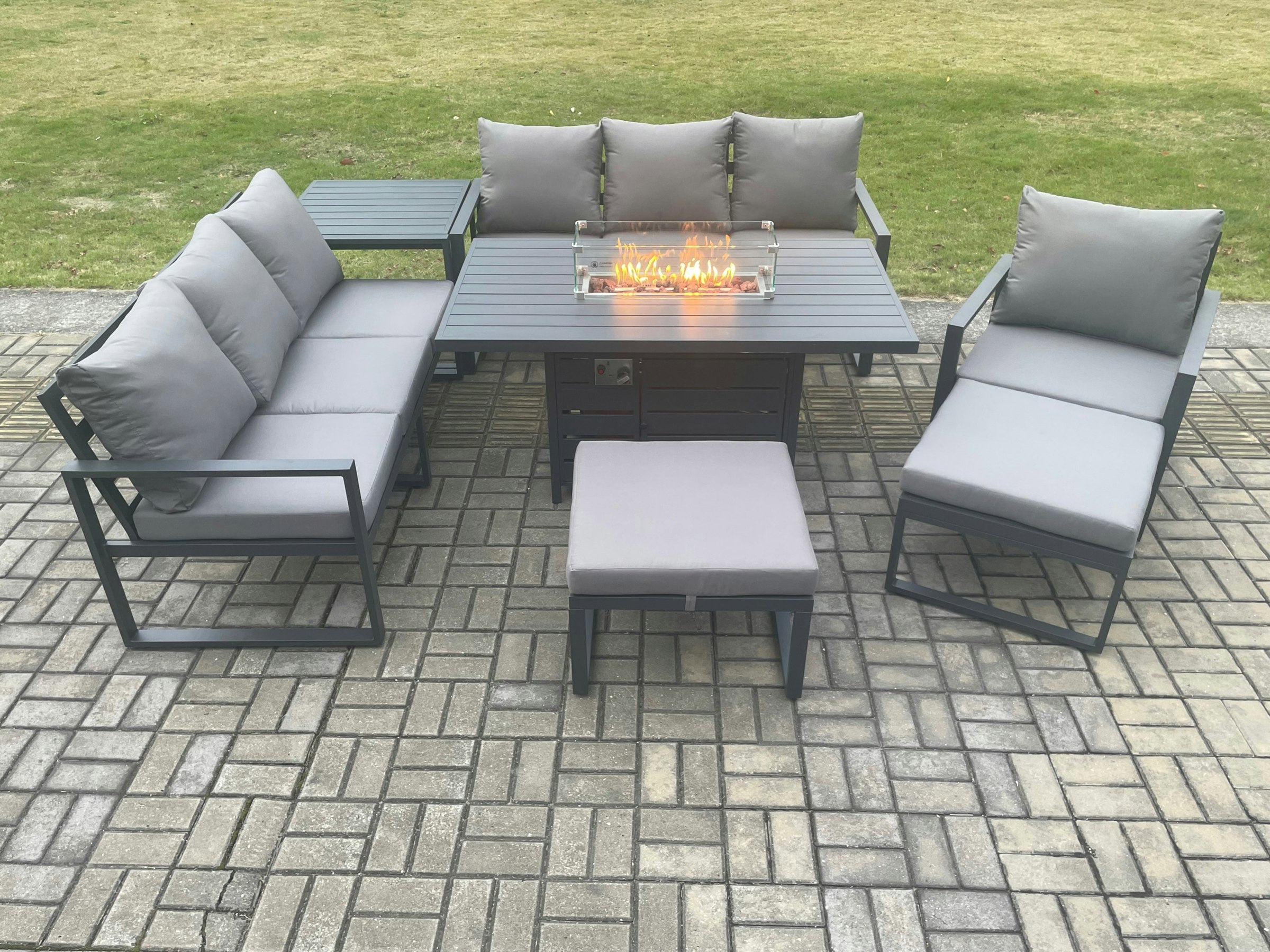 Rackhams Dark/Grey Aluminium 7 Pieces Garden Furniture Sofa Set With Cushions 9 Seater Gas Fire Pit Dining Table Set With Side Table 2 Big Footstools