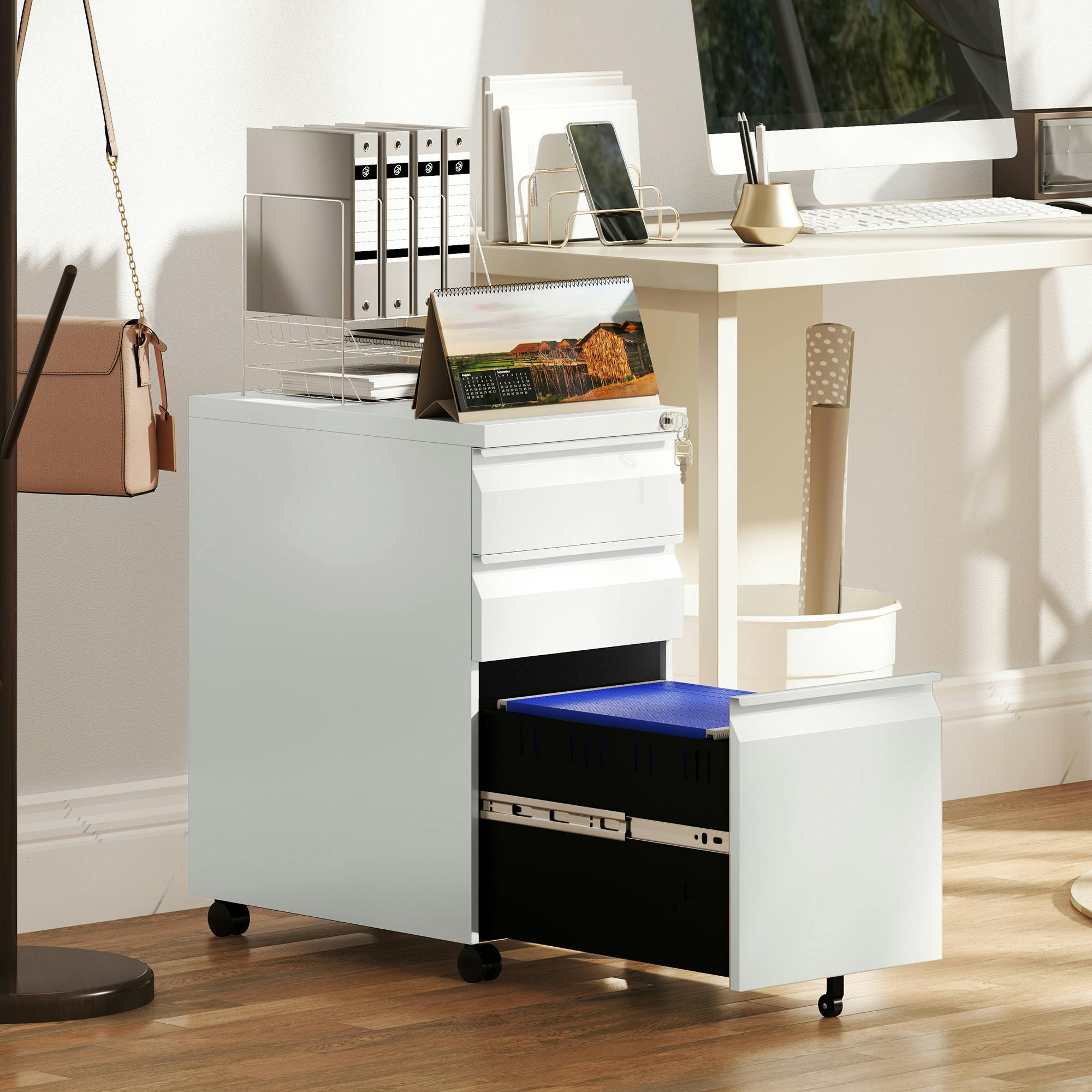 Rackhams "Three Drawers And A Detachable Pencil Tray","Adjustable Rail In Large Drawer For Three Sizes","Top Lock Secures All Drawers With Two Keys"