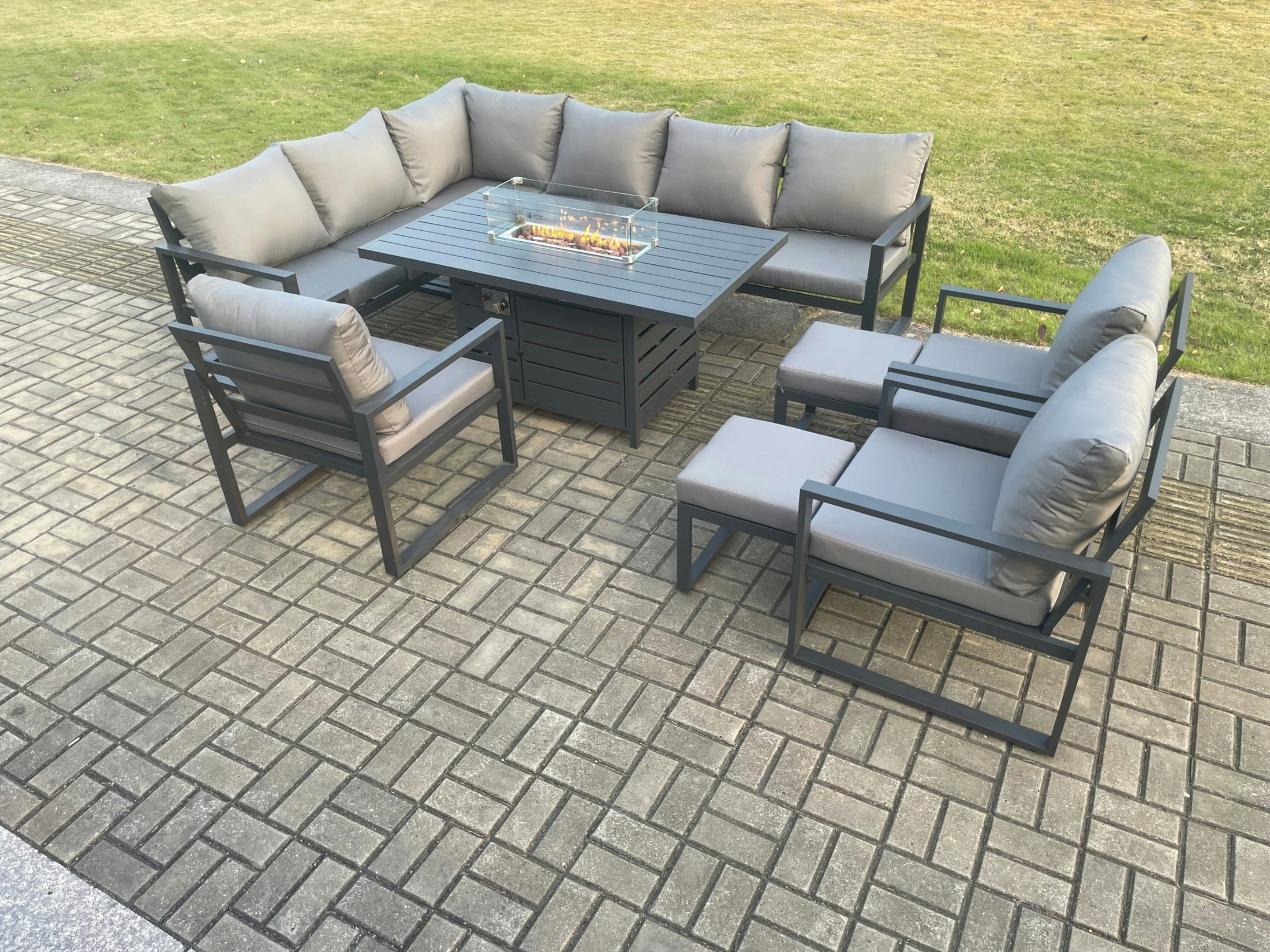 Rackhams Dark/Grey Aluminium Patio Outdoor Garden Furniture Corner Sofa Set Gas Fire Pit Dining Table With 3 Chairs 2 Small Footstools