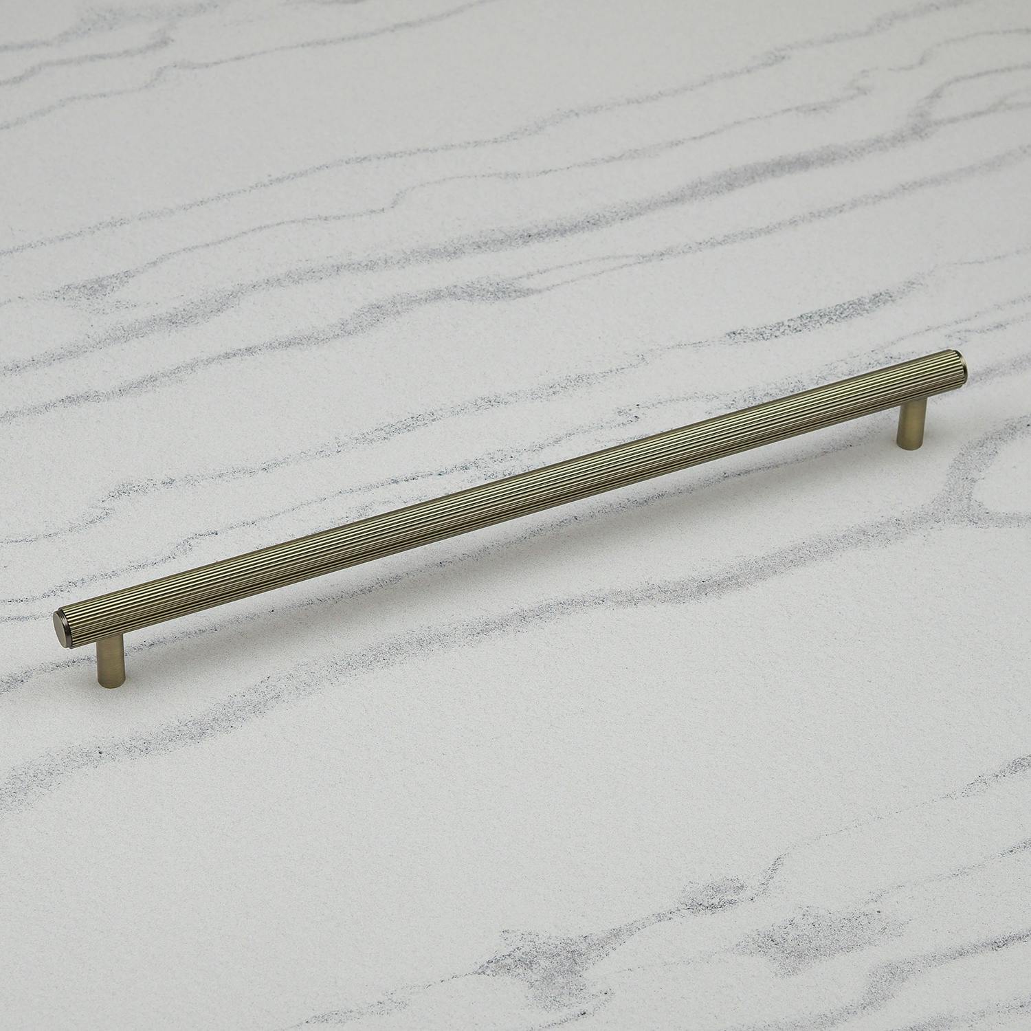Rackhams Antique Brass Reeded Handles And Coordinating Knobs - 320Mm Handle