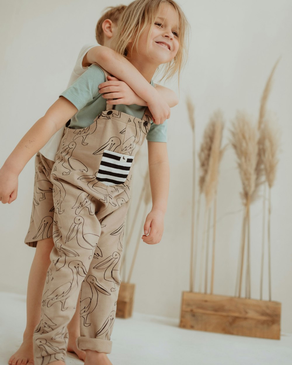 Turtledove London Beige Pelican Print Dungarees - Stone - 6-7 Years