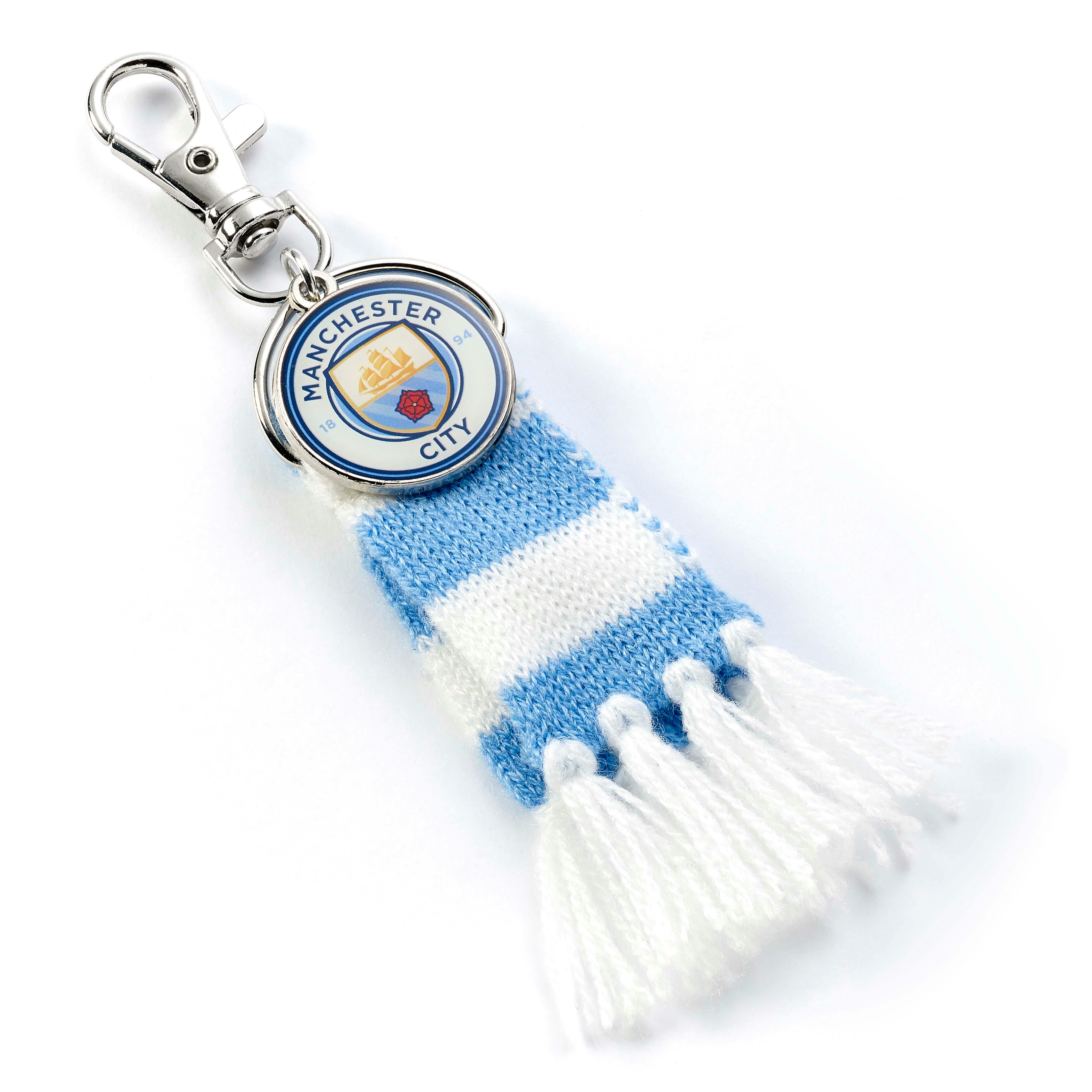 The Carat Shop Blue Manchester City Football Club Scarf And Logo Charm Backpack Hanger
