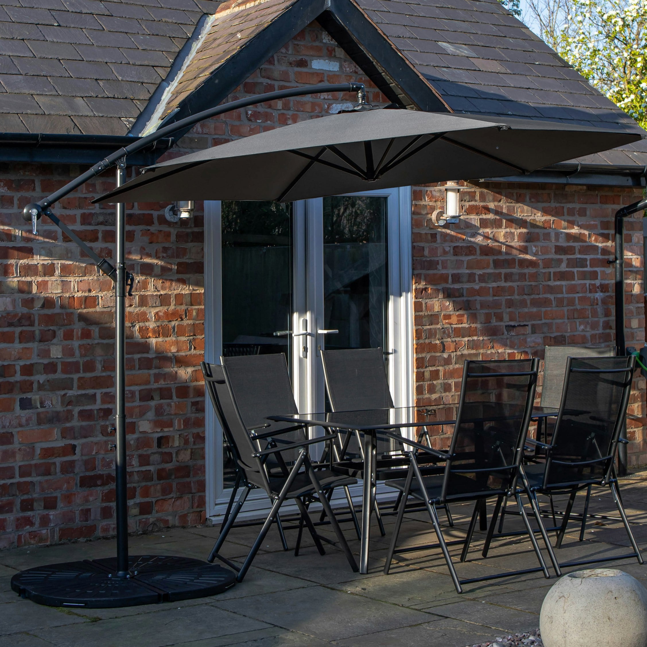 Rackhams Grey Outdoor 6 Person Rectangular Glass Top Garden Dining Table Chairs With Banana Parasol And Base - Outdoor Furniture Sets