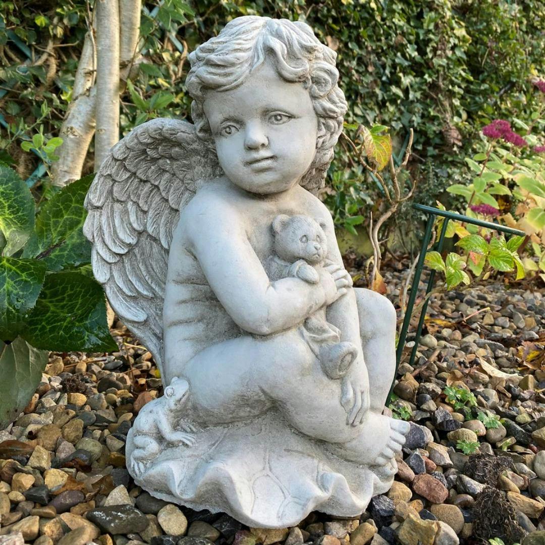 Rackhams Stone Cast Cherub Ornament With Teddy On Hand