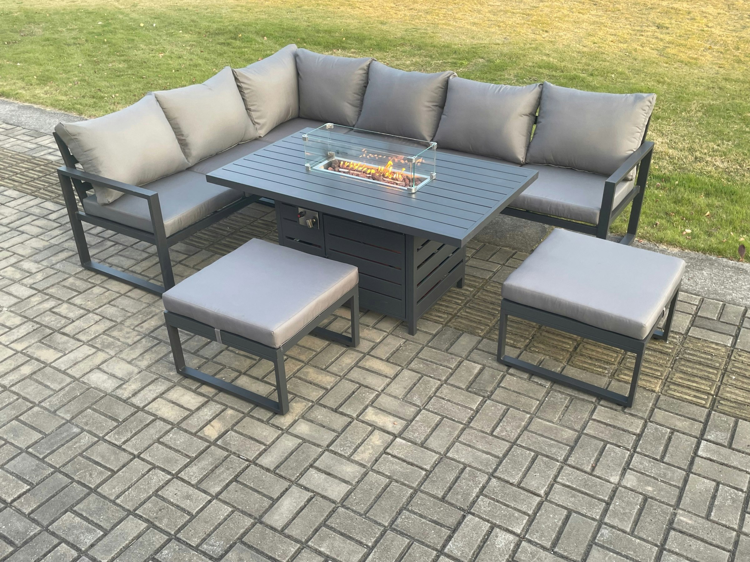 Rackhams Dark/Grey Aluminium Patio Outdoor Garden Furniture Corner Sofa Set Gas Fire Pit Dining Table With 2 Big Footstools