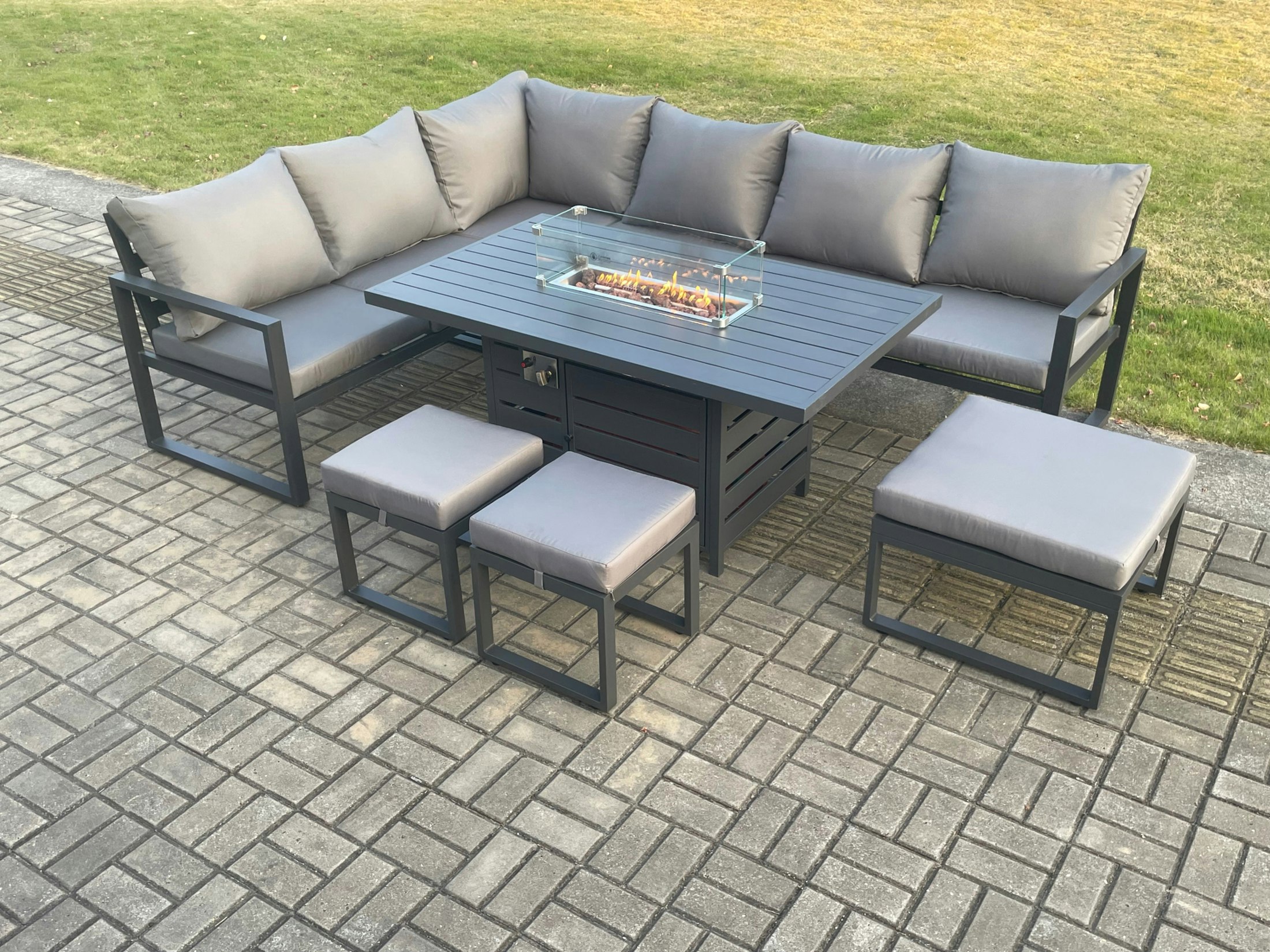 Rackhams Dark/Grey Aluminium 8 Pieces Garden Furniture Corner Sofa Set With Cushions Gas Fire Pit Dining Table Set With 3 Footstools