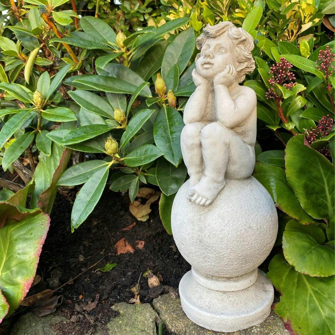 Rackhams Boys Adorable Stone Cast Â€˜ On Ballâ€™ Statue