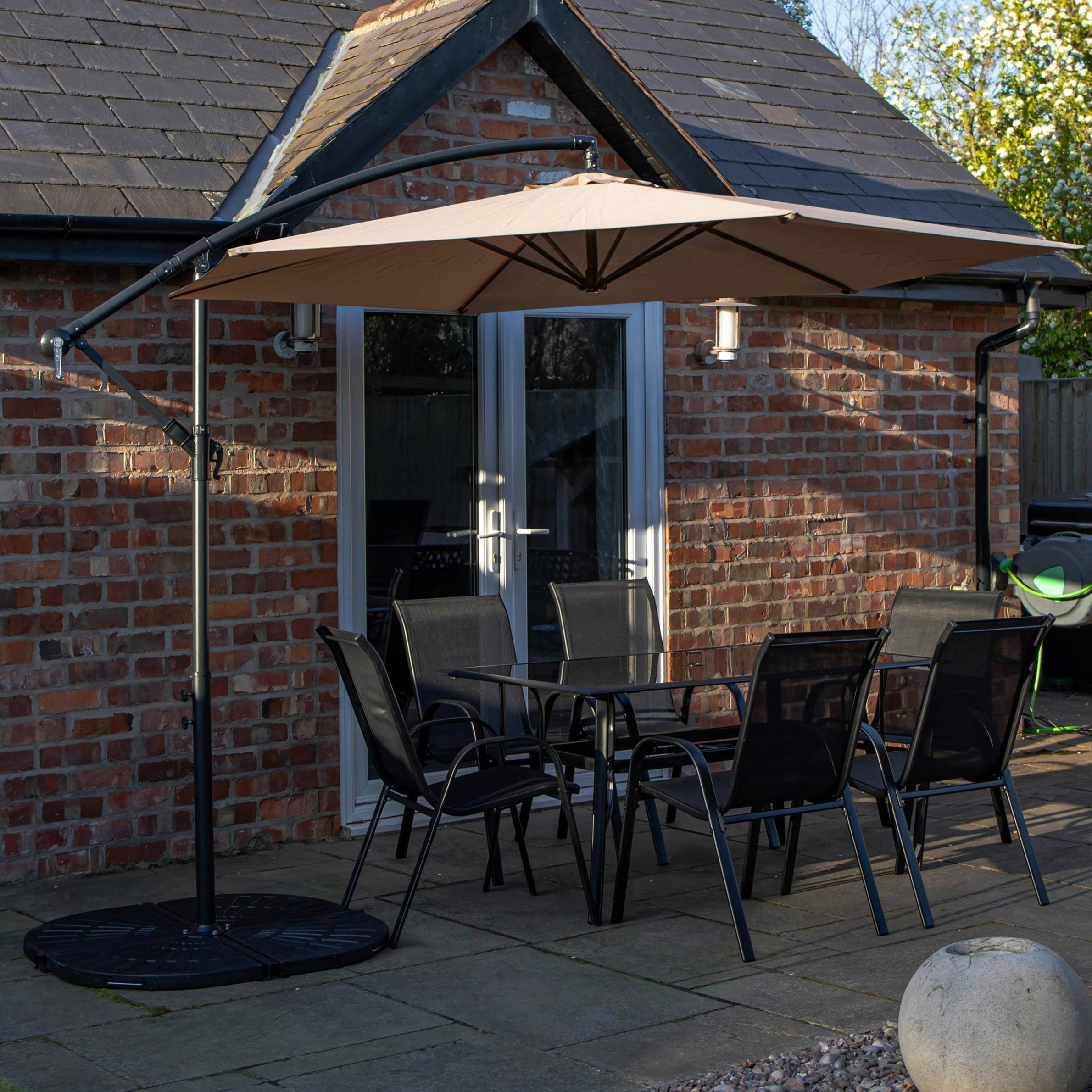 Rackhams Beige Outdoor 6 Person Rectangular Glass Top Garden Dining Table Chairs With Banana Parasol And Base - Outdoor Furniture Sets