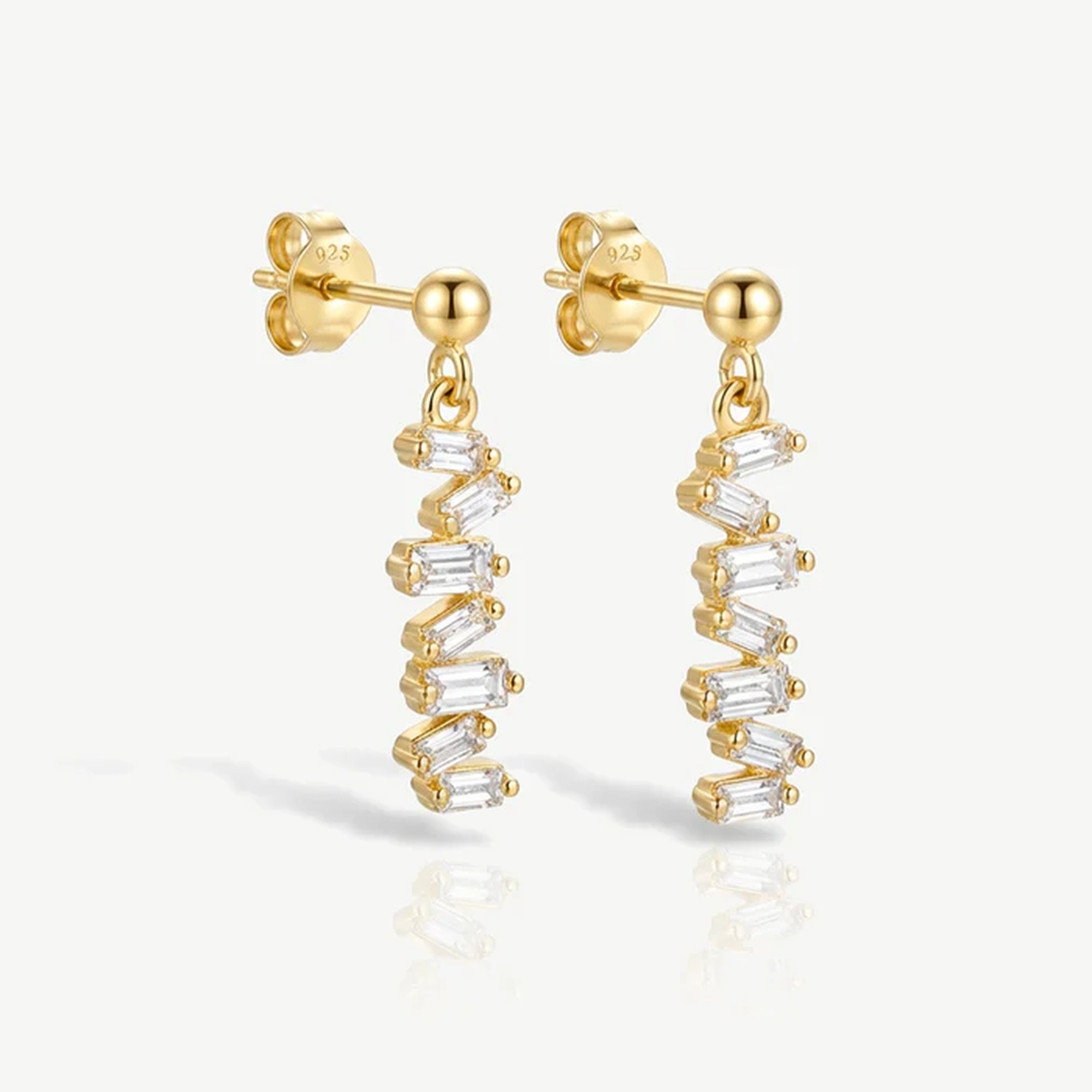 Muchv Gold Vertical Dangle Earrings With Baguette Stones