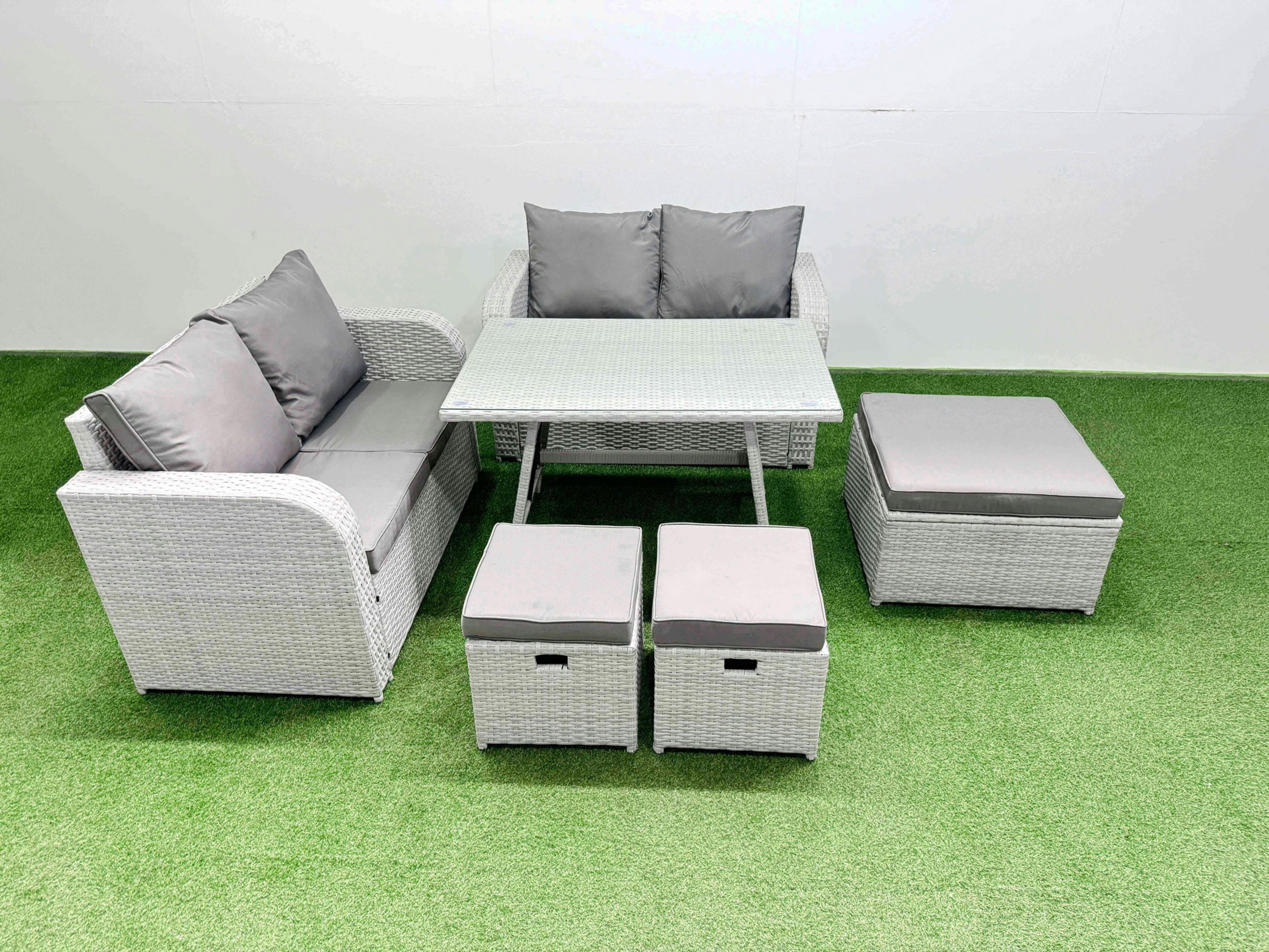 Rackhams Light/Grey 7 Seater Outdoor Love Sofa Set Rattan Garden Furniture Set With Rectangular Dining Table 3 Footstools