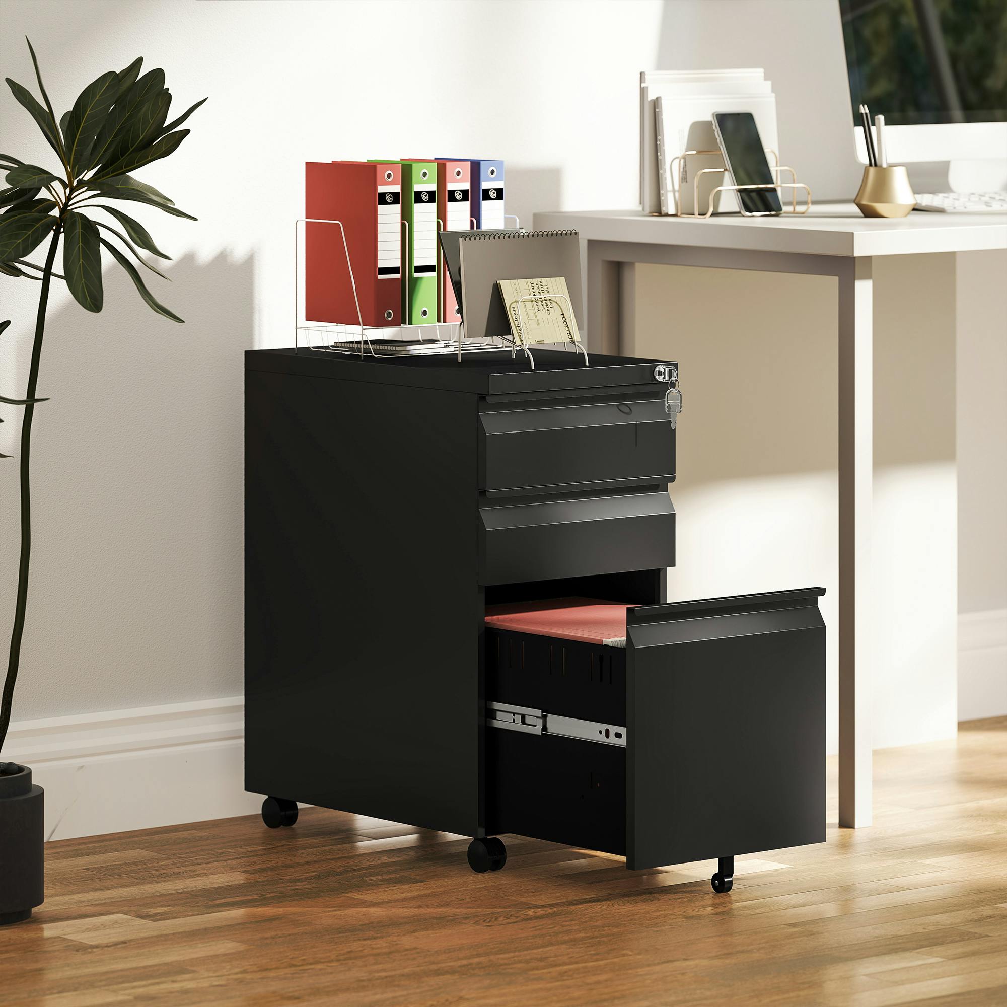 Rackhams Black "Three Drawers And A Detachable Pencil Tray","Adjustable Rail In Large Drawer For Three Sizes","Top Lock Secures All Drawers With Two Keys"