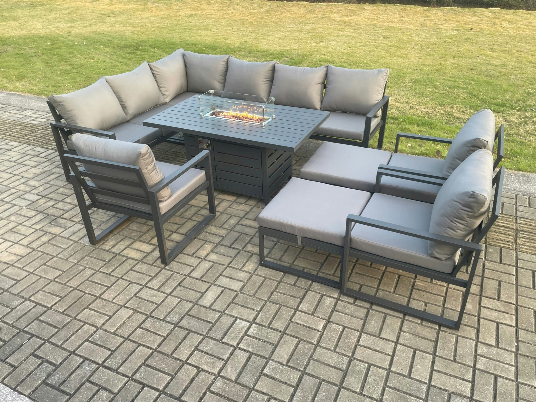 Rackhams Dark/Grey Aluminium Patio Outdoor Garden Furniture Corner Sofa Set Gas Fire Pit Dining Table With 3 Chairs 2 Big Footstools
